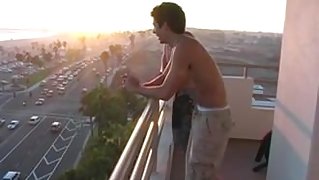 off the balcony for a wank