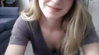 Cute blonde girl shows off her naked body on cam and fingers her pussy