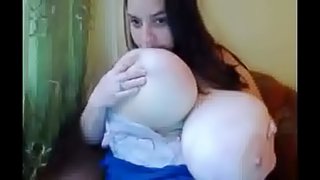 Hot plump brunette teases with her giant tits